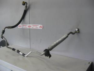 Usagé Tuyau de climatisation Volkswagen Caddy III (2KA,2KH,2CA,2CH) 2.0 SDI Prix sur demande proposé par de Graaf autodemontage B.V.