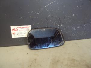 Used Mirror glass, right Toyota Corolla (E10) 1.3 XLi 16V Price on request offered by de Graaf autodemontage B.V.