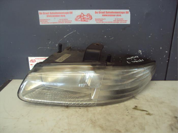 Headlight, left from a Dodge Ram Van 2.4i 16V 2000