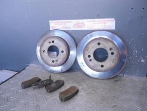 Used Brake disc + block back Kia Picanto (BA) 1.0 12V Price on request offered by de Graaf autodemontage B.V.