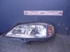 Headlight, left from a Opel Astra G (F08/48), 1998 / 2009 1.6 16V, Hatchback, Petrol, 1.598cc, 74kW (101pk), FWD, X16XEL, 1998-02 / 2000-09 1999