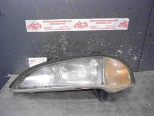 Used Headlight, left Opel Tigra (75) 1.4i 16V Price on request offered by de Graaf autodemontage B.V.