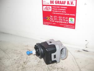 Used Headlight motor Nissan Almera Tino Price on request offered by de Graaf autodemontage B.V.