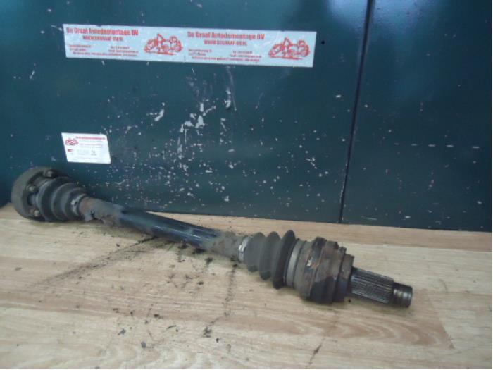 Drive shaft, rear left from a BMW 3 serie Touring (E91) 318i 16V 2008