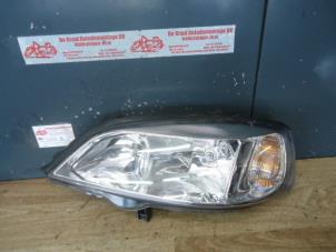 Used Headlight, left Opel Astra G (F07) Price € 30,00 Margin scheme offered by de Graaf autodemontage B.V.