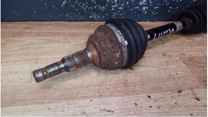 Front drive shaft, left from a Opel Astra G (F08/48) 1.6 2002