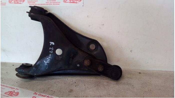 Front wishbone, right from a Renault Twingo II (CN) 1.2 16V 2014