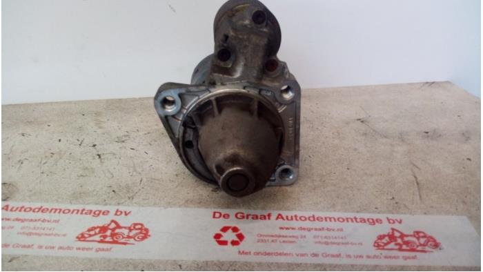 Starter from a Ford Fiesta 5 (JD/JH) 1.4 16V 2002
