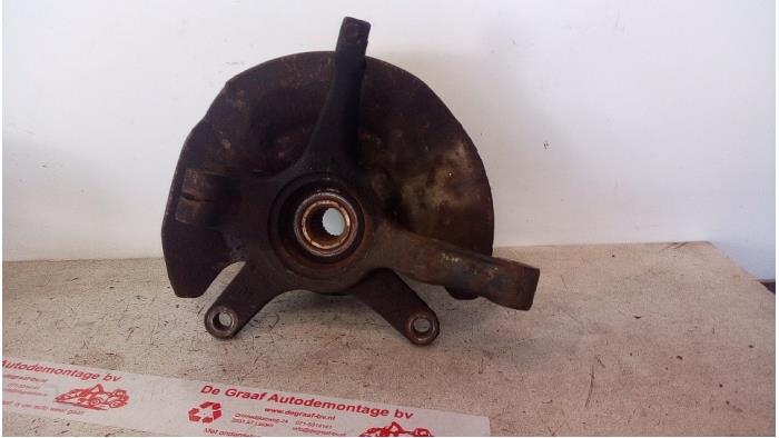Knuckle, front left from a Suzuki Wagon-R+ (RB) 1.3 16V 2002
