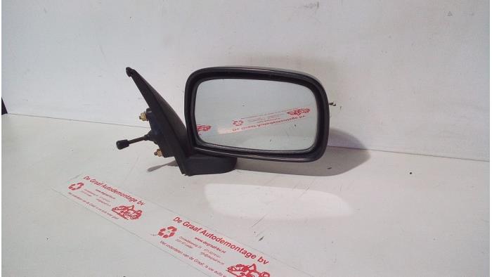 Außenspiegel rechts van een Toyota Starlet (EP9) 1.3,XLi,GLi 16V 1997