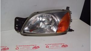 Used Headlight, left Ford Fiesta 4 1.3i Price € 25,00 Margin scheme offered by de Graaf autodemontage B.V.
