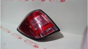 Used Taillight, left Opel Astra H SW (L35) 1.6 16V Twinport Price € 45,00 Margin scheme offered by de Graaf autodemontage B.V.