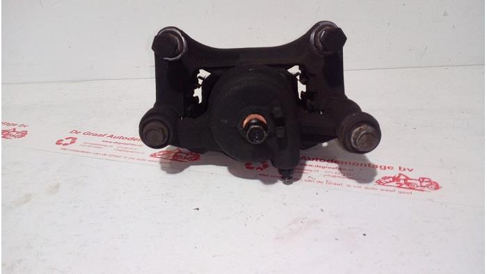 Front brake calliper, left from a Kia Picanto (TA) 1.2 16V 2014