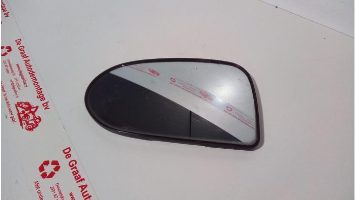 Cristal reflectante izquierda de un Daihatsu Cuore (L251/271/276) 1.0 12V DVVT 2008