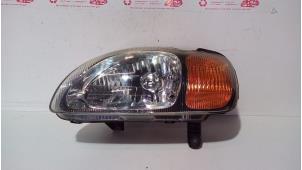 Used Headlight, left Suzuki Baleno (GC/GD) 1.3 GL 16V Price € 40,00 Margin scheme offered by de Graaf autodemontage B.V.