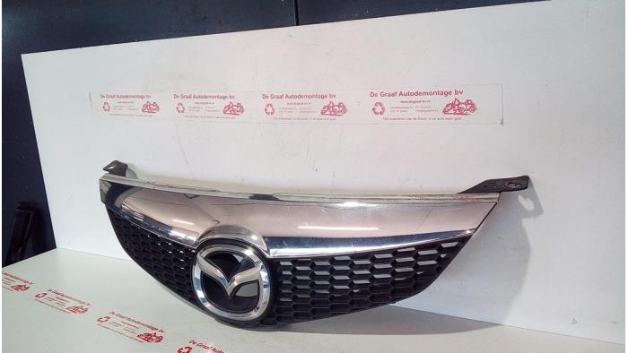 Używane Grill Mazda 6 Sportbreak (GY19/89) 1.8i 16V Cena € 25,00 Procedura marży oferowane przez de Graaf autodemontage B.V.