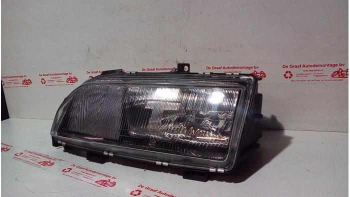 Używane Reflektor lewy Ford Scorpio I Cena € 90,75 Z VAT oferowane przez de Graaf autodemontage B.V.