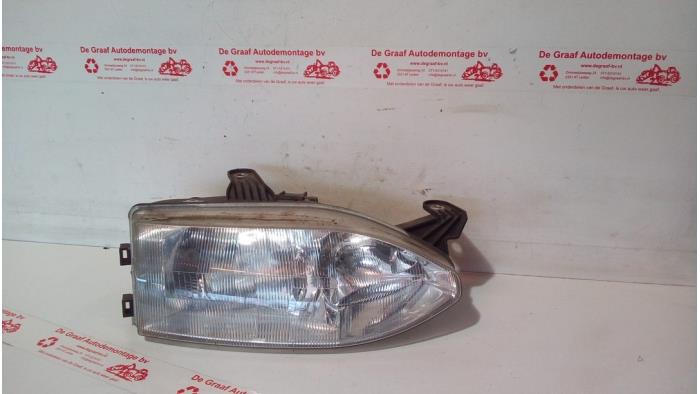 Używane Reflektor prawy Fiat Palio Weekend (178D) 1.6 16V Torque Cena € 30,00 Procedura marży oferowane przez de Graaf autodemontage B.V.