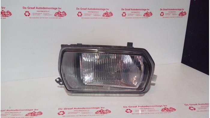 Używane Reflektor lewy Audi 100 (C1) Cena € 125,00 Procedura marży oferowane przez de Graaf autodemontage B.V.