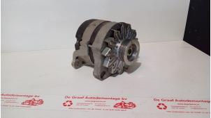Usados Dinamo Lancia Delta (836) 1.6 i.e. Precio € 65,00 Norma de margen ofrecido por de Graaf autodemontage B.V.