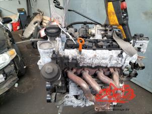 Engine from a Volkswagen Golf V (1K1) 1.6 FSI 16V 2008