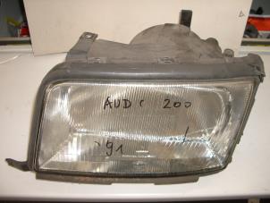 Używane Reflektor lewy Audi 100 (C4) 2.8 E Cena na żądanie oferowane przez de Graaf autodemontage B.V.