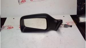 New Wing mirror, left Renault R21 Price on request offered by de Graaf autodemontage B.V.
