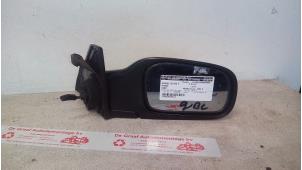 Used Wing mirror, right Nissan Sunny Q-bic (Y10) 1.7 Q-Bic Price on request offered by de Graaf autodemontage B.V.