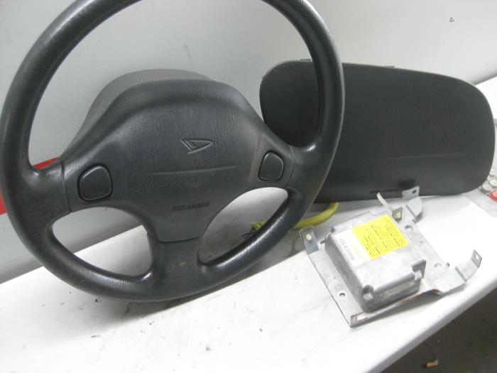 Juego y módulo de airbag de un Daihatsu Cuore (L251/271/276) 1.0 12V 2000