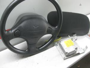 Usados Juego y módulo de airbag Daihatsu Cuore (L251/271/276) 1.0 12V Precio de solicitud ofrecido por de Graaf autodemontage B.V.