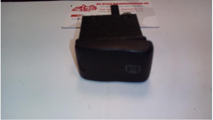Rear window heating switch from a Volkswagen Caddy 1998