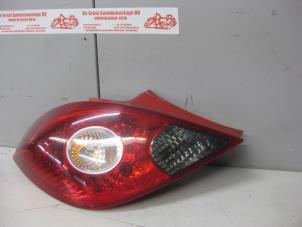 Used Taillight, left Opel Corsa D 1.2 16V Price on request offered by de Graaf autodemontage B.V.