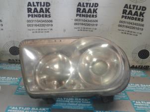 Used Headlight, right Chrysler 300 C Price on request offered by "Altijd Raak" Penders
