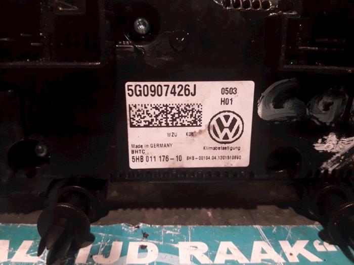 Panel de control de calefacción de un Volkswagen Golf VII (AUA) 1.4 TSI 16V 2015