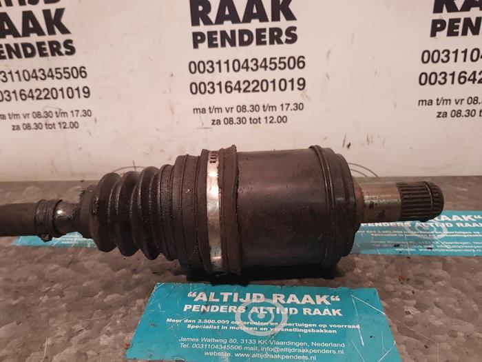 Front drive shaft, left from a BMW 3 serie (E30/2) (E30/4) 325e 2.7 1985
