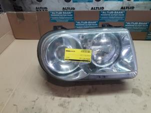 Used Headlight, right Chrysler 300 C Touring 3.5 V6 24V Price on request offered by "Altijd Raak" Penders