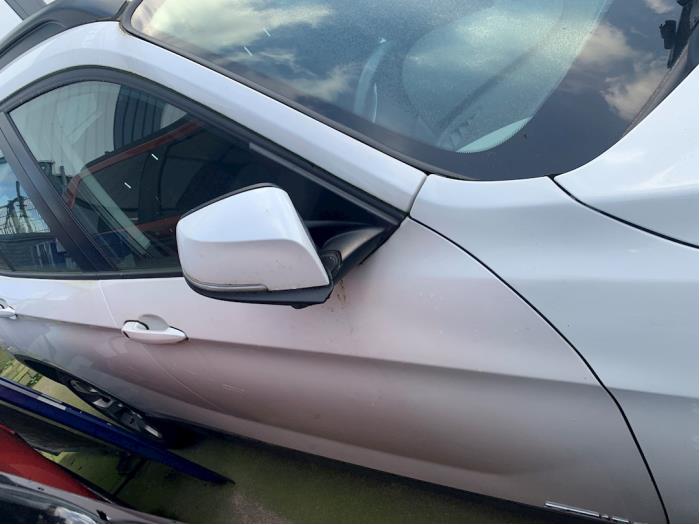 Rear side panel, right from a BMW X1 (E84) sDrive 16d 2.0 16V 2015