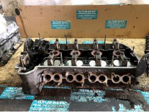 Used Cylinder head Mercedes 190 (W201) 2.3 E 16V Kat. Price on request offered by "Altijd Raak" Penders