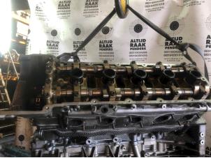Used Cylinder head BMW 5 serie (E60) M5 V-10 40V LHD Price on request offered by "Altijd Raak" Penders