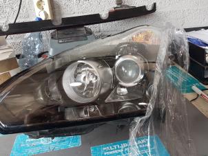 Used Headlight, left Nissan GT-R (R35) 3.8 V6 24V Twin Turbo 4x4 Price on request offered by "Altijd Raak" Penders