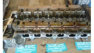 Used Cylinder head BMW 5 serie (E60) 525i 24V Price on request offered by "Altijd Raak" Penders