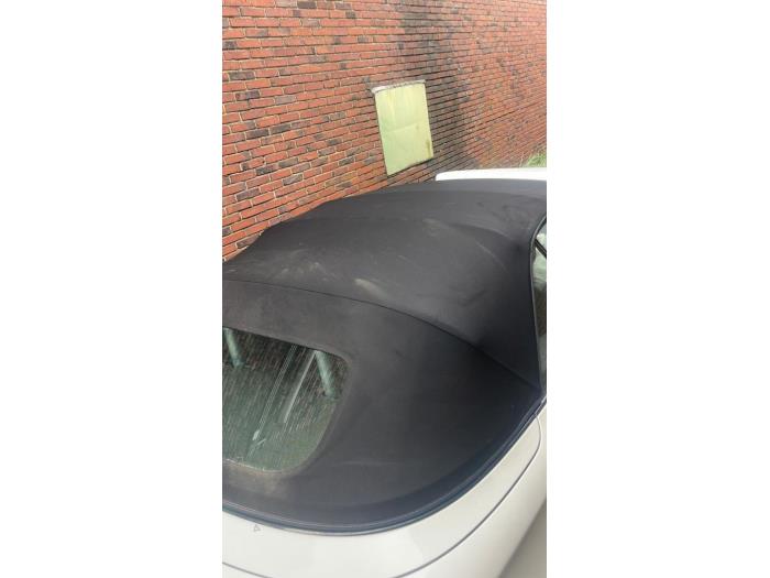 Außenspiegel links van een BMW 1 serie (E88) 118d 16V 2013