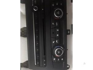 Usados Panel de control de aire acondicionado BMW X3 (F25) Precio de solicitud ofrecido por "Altijd Raak" Penders