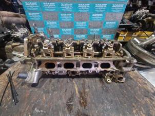 Used Cylinder head BMW 1 serie (F20) 114i 1.6 16V Price on request offered by "Altijd Raak" Penders