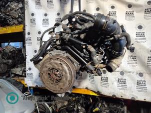 Engine from a Volkswagen Caddy Combi III (2KB,2KJ) 1.9 TDI 2007