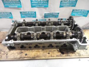 Used Cylinder head Saab 9-5 Price on request offered by "Altijd Raak" Penders