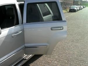 Used Rear door 4-door, left Jeep Grand Cherokee (WH/WK) 3.0 CRD V6 24V DPF Price on request offered by "Altijd Raak" Penders