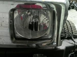 Used Headlight, left Hummer H3 3.7 20V Price on request offered by "Altijd Raak" Penders