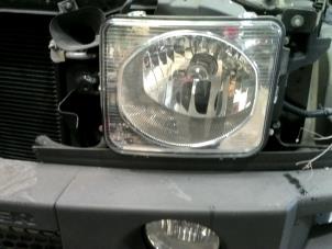 Used Headlight, left Hummer H3 3.7 20V Price on request offered by "Altijd Raak" Penders