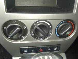 Używane Panel sterowania klimatyzacji Jeep Patriot (MK74) 2.0 CRD 16V 4x4 Cena na żądanie oferowane przez "Altijd Raak" Penders